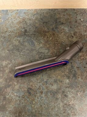 Dyson Soft Roller Brush Head in Gray with Blue and Red Accents